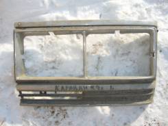 Ободок фары. Nissan Caravan