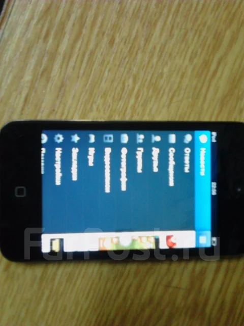 Apple iPod touch 4. ����
