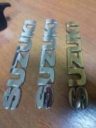 Эмблема. Suzuki: Aerio, Esteem, Cultus Crescent, Escudo, Cultus, MR Wagon