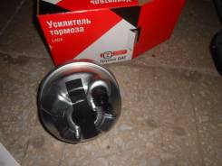 Вакуумный усилитель тормозов.