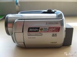 Panasonic SDR-H250. Менее 4-х Мп, с объективом