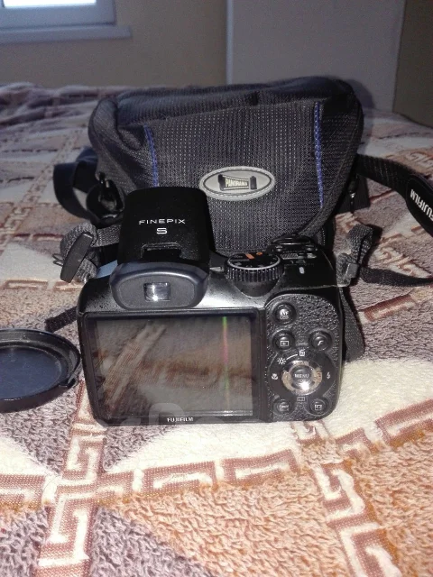 Fujifilm FinePix S2950. 10 - 14.9 ��, ���: 14� � ����� ����