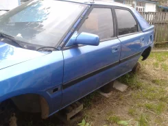 Mazda 323F ����