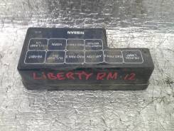 Крышка блока предохранителей. Nissan Liberty, RM12 Двигатель QR20DE