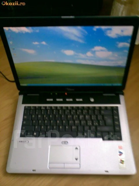 Fujitsu Amilo M1437G. 15.4", 1,7����, ��� 1024 ��, ���� 100���, WiFi: 1, Bluetooth: 1, ����������� �� 8��. ����