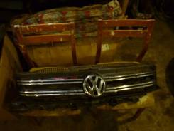 Молдинг решетки радиатора. Volkswagen Tiguan
