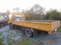 Nissan Condor. Продается грузовик Nissan - Condor 1994г. Широкая кабина. Кузов 4.5м. в, 4 200 куб. см., 2 500 кг.