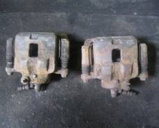 Суппорт тормозной. Nissan Almera, N15