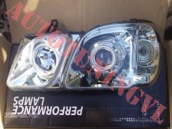 Фара. Toyota Land Cruiser Cygnus, UZJ100W Lexus LX470