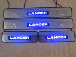 Накладка на порог. Mitsubishi Lancer X