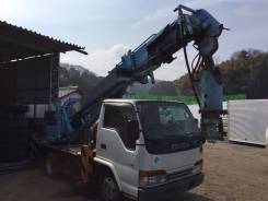 Isuzu Elf. ямобур , буровая, 4 560 куб. см.