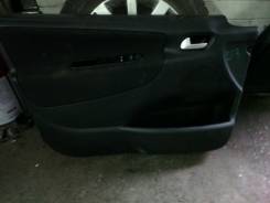 Обшивка двери. Peugeot 207