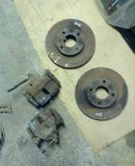 Суппорт тормозной. Nissan Almera, N16