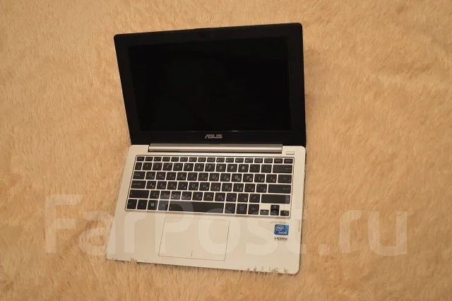 Asus X201E. 11.6", ��� 2048 ��, ���� 320���, WiFi: 1, Bluetooth: 1 ����