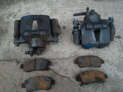 Суппорт тормозной. Toyota: Vitz, bB, Raum, Funcargo, Sienta, ist, Platz, Probox Двигатели: 1SZFE, 2SZFE, 2NZFE