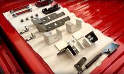 Пружина (доводчик) заднего борта для Toyota Hilux 2016+ , L200 2016+