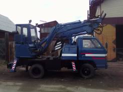 Isuzu Elf. Продам грузовик с эксковаторной установкой Isuzu ELF