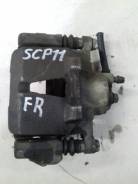 Суппорт тормозной. Toyota Platz, SCP11 Двигатель 1SZFE