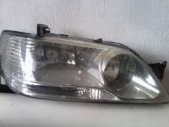 Фара. Mitsubishi Lancer Cedia, CS2A Двигатель 4G15