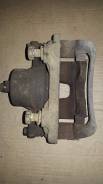 Суппорт тормозной. Nissan: Bluebird, Primera Camino, Primera, Avenir, Prairie Двигатели: SR18DE, SR20DE, QG18DE, CD20, SR18DI, CD20E, CA18I, QG18DD, S...