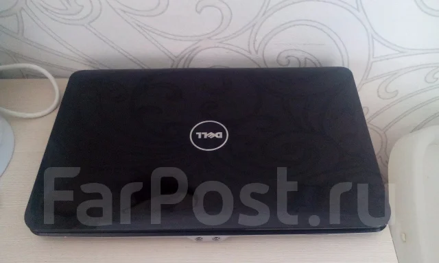 Dell Vostro 1015. 15.6", 2,2����, ��� 2048 ��, WiFi: 1, Bluetooth: 1 ����
