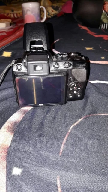 Nikon Coolpix P100. 10 - 14.9 ��, ���: 14� � ����� ����