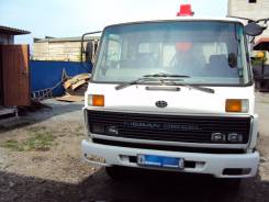 Nissan Diesel UD. Продается грузовик Nissan UD c манипулятором, 7 000 куб. см., 5 000 кг.