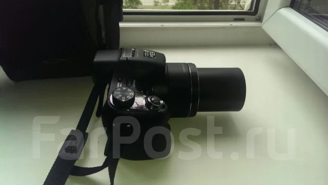 Sony Cyber-shot DSC-H400. 20 � ����� ��, ���: 14� � ����� ����