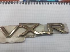 Эмблема VX-R золото оригинал Toyota 75473-60060, правая