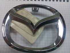 Эмблема передняя решетки радиатора оригинал Mazda D350-51-731