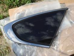 Стекло боковое. Nissan Almera