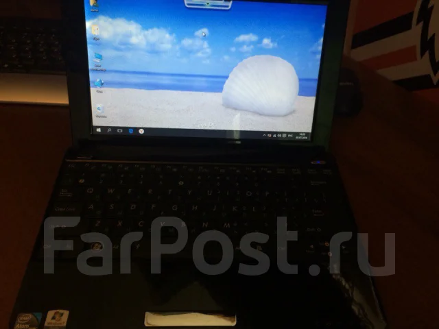 Asus Eee PC 1005P. 10.1", 1,7����, ��� 2048 ��, ���� 160���, WiFi: 1, ����������� �� 11��. ����
