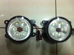 Фара противотуманная. Mitsubishi: Grandis, Eclipse, Delica D:5, L200, Colt Plus, Delica, Triton, Pajero, Airtrek, Montero, Outlander, Endeavor, Colt N...