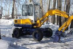 Komatsu PC20. Экскаватор колесный, 1 430 куб. см., 0,10 куб. м.