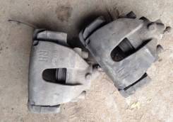 Суппорт тормозной. Ford Focus