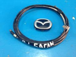 Тросик багажника. Mazda Protege Mazda Familia, BJ3P, BJ5P, BJ5W, BJ8W, BJEP, BJFP, BJFW Mazda 323 Двигатели: ZL, ZLDE, ZLVE