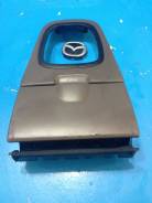 Консоль центральная. Mazda Protege Mazda Familia, BJ3P, BJ5P, BJ5W, BJ8W, BJEP, BJFP, BJFW Mazda 323 Двигатели: B3, B3ME, ZL, ZLDE, ZLVE