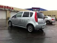 Mitsubishi Colt. Без водителя