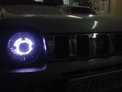 Фара. Suzuki Jimny, JA12C, JA12V, JA12W, JA22W, JB23W, JB31W, JB32W, JB33W Двигатели: F6A, G13B, K6A