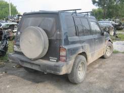 Suzuki Escudo. TD01W, G16A