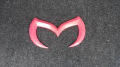 Эмблема. Mazda