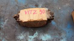 Колодка тормозная. Toyota: Vitz, Yaris, Porte, Allion, Spade, Vios, Premio, Corolla Axio, Belta Двигатели: 1NZFE, 2SZFE, 1KRFE, 2NZFE, 1NRFE, 1ZRFE