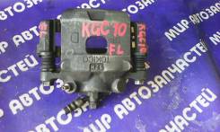 Суппорт тормозной. Toyota Passo, KGC10 Двигатель 1KRFE
