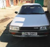 Mazda 323. механика, передний, 2.0 (118 л.с.), бензин, 350 000 тыс. км