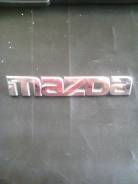Эмблема. Mazda