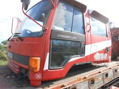 Кабина. Isuzu Forward Двигатели: 6BG1, 6HE1TC, 6HE1TCC, 6HE1TCN, 6HF1TCN, 6HF1TCS, 6HK1TCC, 6HK1TCN, 6HK1TCS