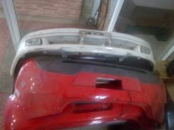 Бампер Mazda Demio, задний