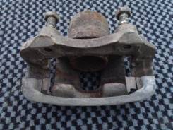 Суппорт тормозной. Nissan Bluebird, EU13
