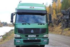 Howo. Тягач HOWO, 10 000 куб. см., 33 000 кг.