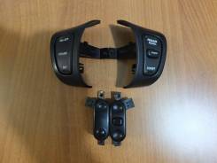 Переключатель на рулевом колесе. Jeep Grand Cherokee